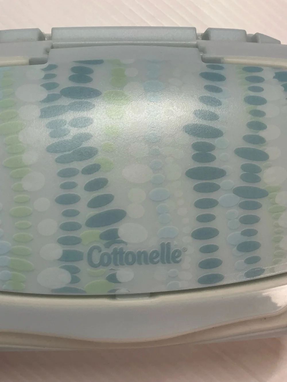 Cottonelle Mostly Colored Blue w/ Green with Word Logo Print Top Pop-Up Dispense
